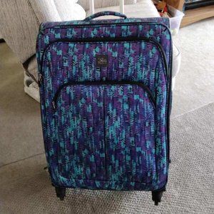 28" Tall Softside Luggage Great Shape Full roller retractable handle.